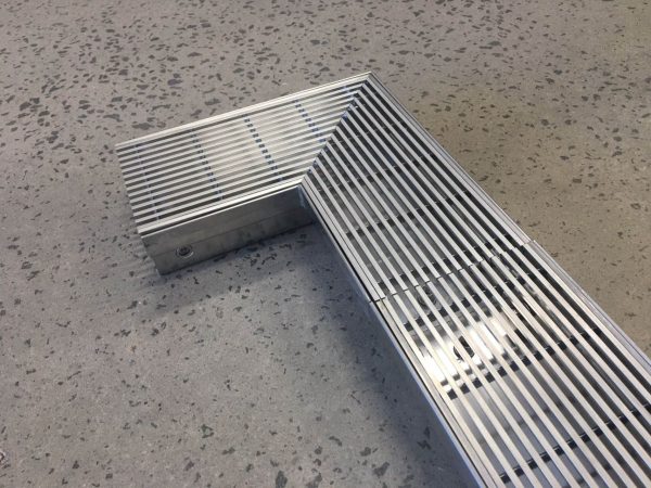 Stainless steel linear drain with corner